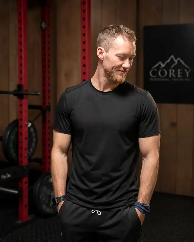 Corey Forrester, online personal trainer, in a private training space